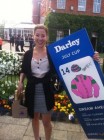 Hayley Turner holding the donated placard